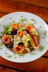 Ketogenic diet salad with greens and torut