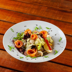 Ketogenic diet salad with greens and torut