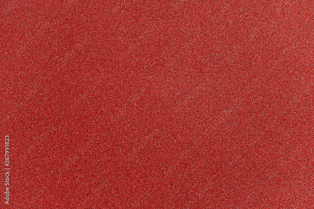 Wall mural abstract red glitter paper texture background or backdrop. empty shimmer paper or shiny paperboard f