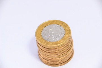 stack of coins isolated on white background