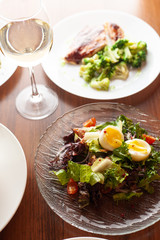 Perfect dinner with cobb egg salad and a glass of white wine