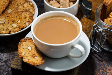 coffee with milk and Italian cookies cantucci, top view