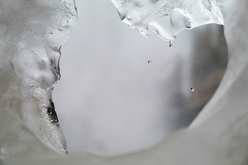 Water droplets captured on melting ice.