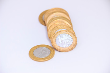 stack of coins isolated on white background