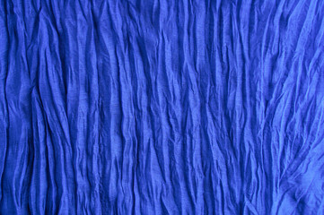 Blue fabric. Pressed cotton. Fragment of the texture.