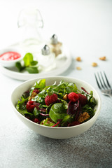 Prosciutto salad with walnuts and fresh raspberries
