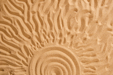 Fototapeta na wymiar Sun and ocean on sand on beach background sign concept