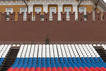 Preparations for the celebration. Empty tribunes in tricolor colors on Red Square in Moscow