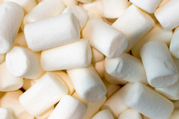 Marshmallow. Sweets, dessert, sweets in the form of worms or snakes. Baby delicacy.