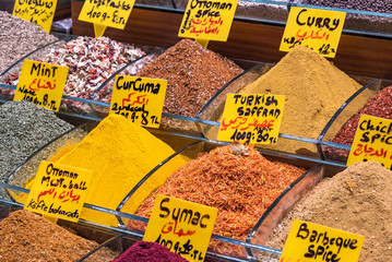 ISTANBUL,TURKEY - APRIL 04, 2019: Piles of traditional Turkish spices with price labels at famous...