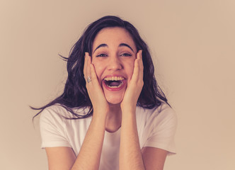 Young excited woman shocked and happy looking at unbelievable sales or surprise with overjoy
