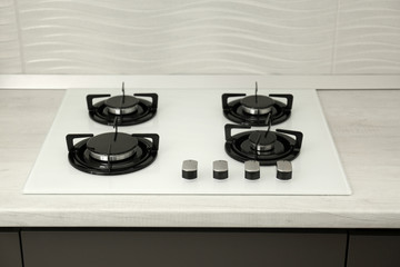 Obraz na płótnie Canvas Modern built-in gas cooktop. Kitchen appliance
