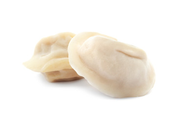 Fototapeta na wymiar Fresh tasty boiled dumplings on white background