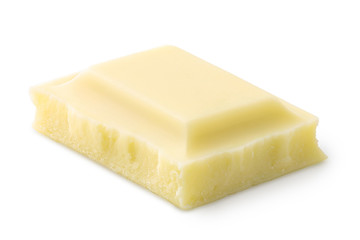 Single square of white chocolate isolated on white. Rough edges.