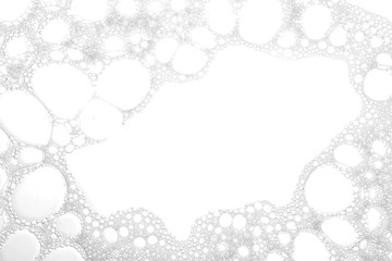 Soft white soap foam as background, closeup