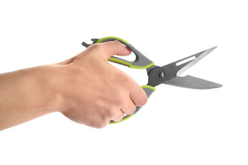 Man holding pair of kitchen scissors isolated on white, closeup