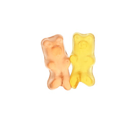 Delicious colorful jelly bears on white background