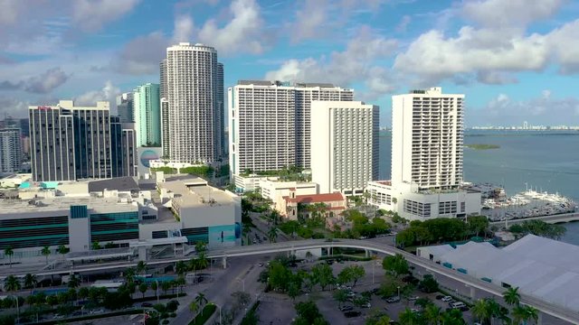MIAMI, FLORIDA, USA - MAY 2019: Aerial drone view flight over Miami downtown. Streets, residential buildings from above.