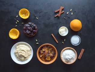 Ingredients for a pie with dates are laid out 