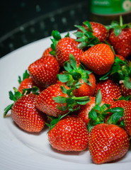 pile of strawberries on a plate