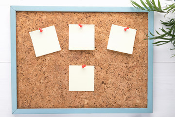 four stickers or blanks on a corkboard, concept of notifications, copy space, concept of planning or reminders