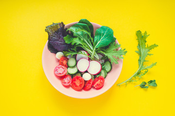 fresh  vegetables and lettuce on a plate