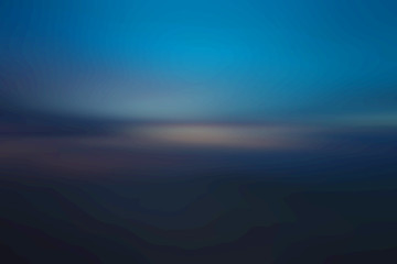 Blurred background, dark blue tones, slight light