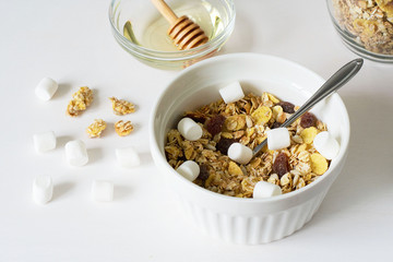 Healthy breakfast. Fresh granola on a white background