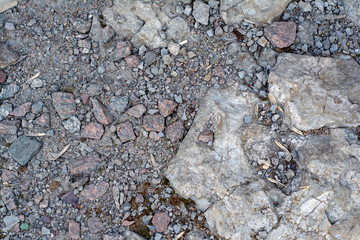 Background from different sizes of gravel and large stones.