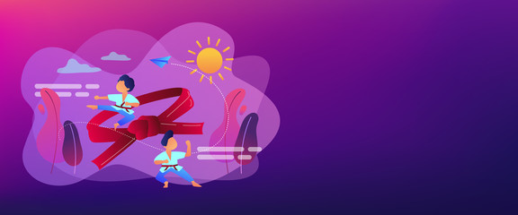 Young athletes doing karate outside at summer camp and big belt, tiny people. Karate camp, kids boxing club, fighting sport section concept. Header or footer banner template with copy space. © Visual Generation