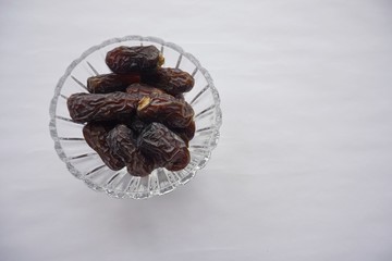 Kurma or dates fruits isolated on white background