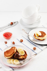 breakfast. Pancakes with peanut butter and bananas.