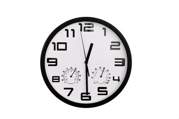 simple classic black and white round wall clock isolated on white. Clock with arabic numerals on wall shows 12:30 , 00:30