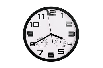 simple classic black and white round wall clock isolated on white. Clock with arabic numerals on wall shows 15:40 , 3:40