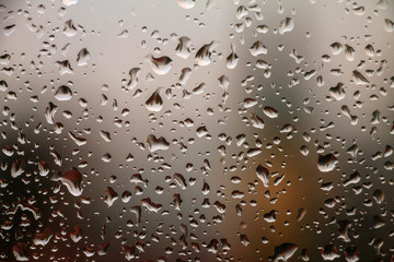 Rain  drops on window glass , rainy day