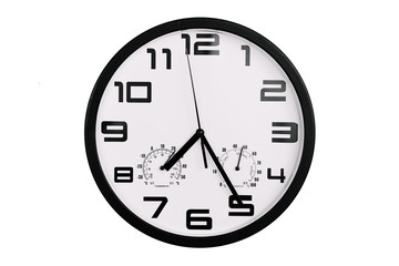 simple classic black and white round wall clock isolated on white. Clock with arabic numerals on wall shows 19:25