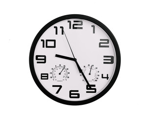 simple classic black and white round wall clock isolated on white. Clock with arabic numerals on wall shows 9:25 , 21:25