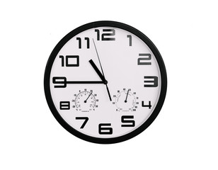 simple classic black and white round wall clock isolated on white. Clock with arabic numerals on wall shows 10:45 , 22:45