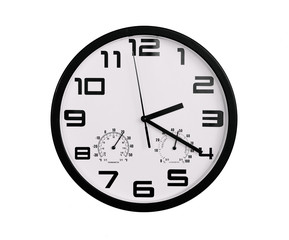 simple classic black and white round wall clock isolated on white. Clock with arabic numerals on wall shows 2:20 , 14:20