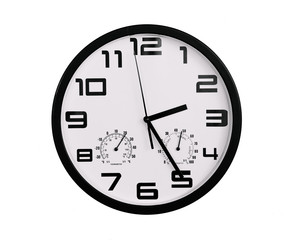 simple classic black and white round wall clock isolated on white. Clock with arabic numerals on wall shows 2:25 , 14:25