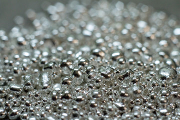 Closeup of a drop of silver for the manufacture of handmade jewelry