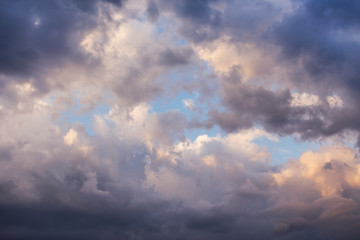 Obraz premium Epic beautiful cumulus fluffy white clouds in sunlight against blue sky background, heaven
