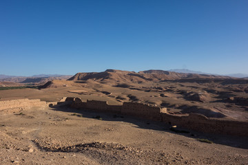 Morning view on the desert from the top of the Kasbah Ait Ben Haddou near Ouarzazate in the Atlas Mountains of Morocco.