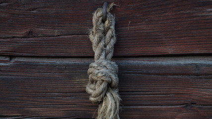 Fototapeta na wymiar Rope on wooden background