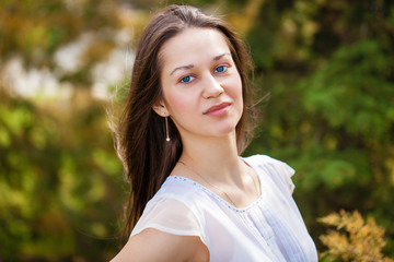 Portrait of beautiful young happy woman