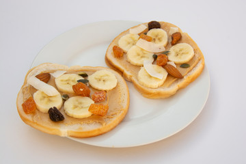 Obraz na płótnie Canvas Peanut butter sandwich breakfast or snack on white background.