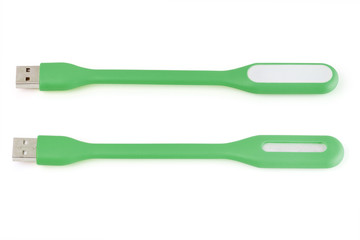 USB green plastic LED light lamp, isolated on a white background. Closeup.