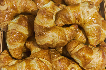 Fresh lush croissants handmade. Banquet table. Catering