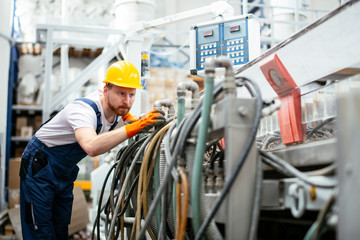 Portrait of man working in factory