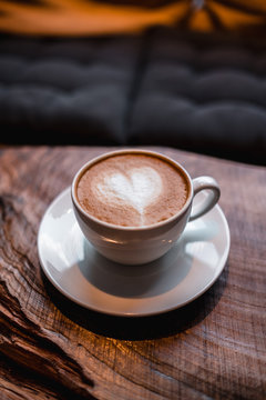 heart atop coffee drink